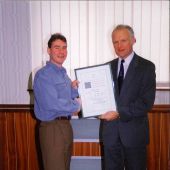 John Jolley, Station Manager (on right) presenting Long Service Award.