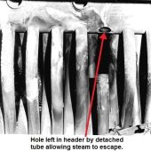 Hole left in header by detached tube